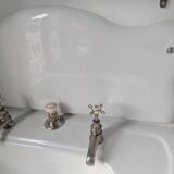 Set of a sink and its retro ceramic splashback.