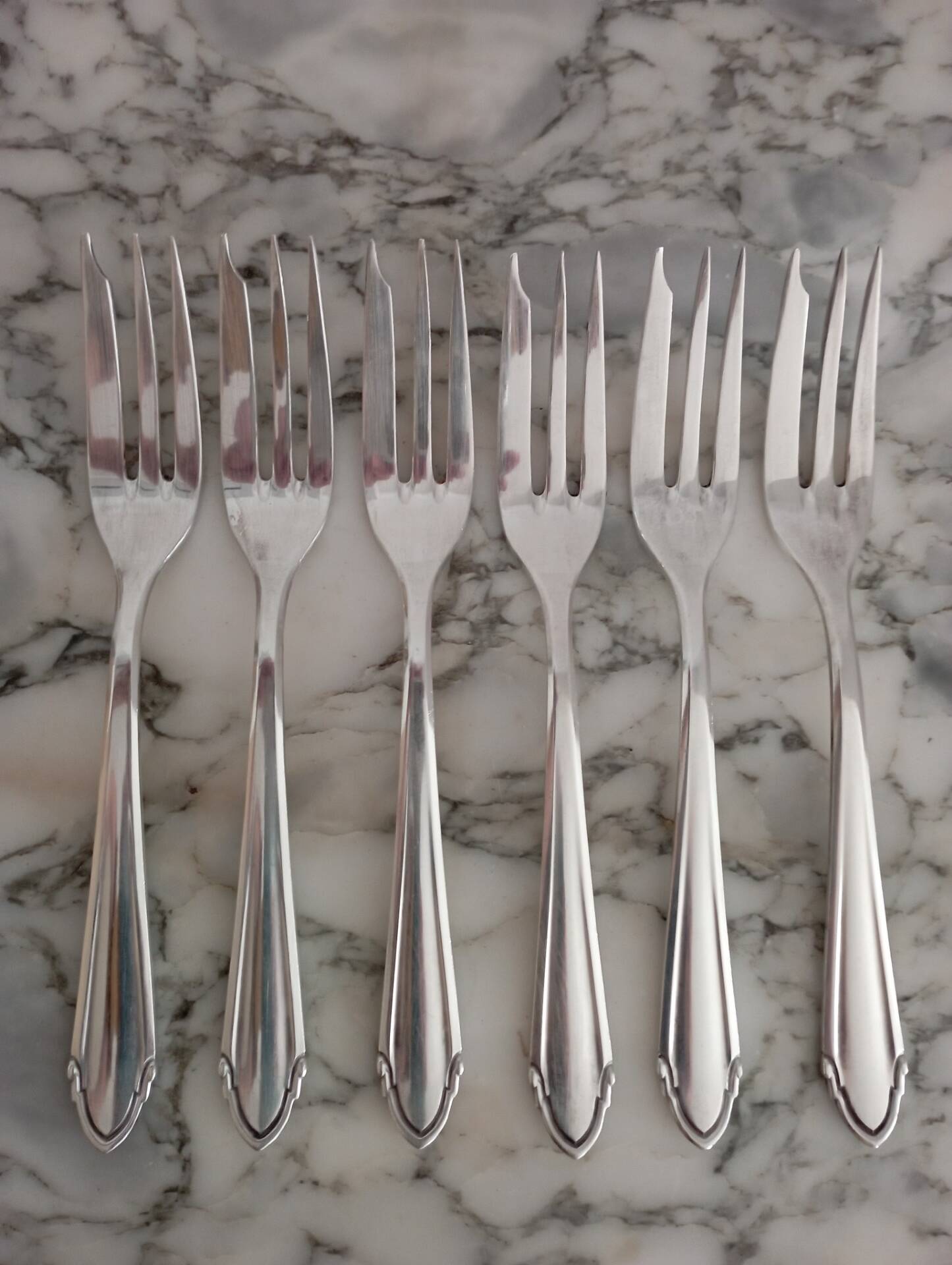 Silver metal dessert forks