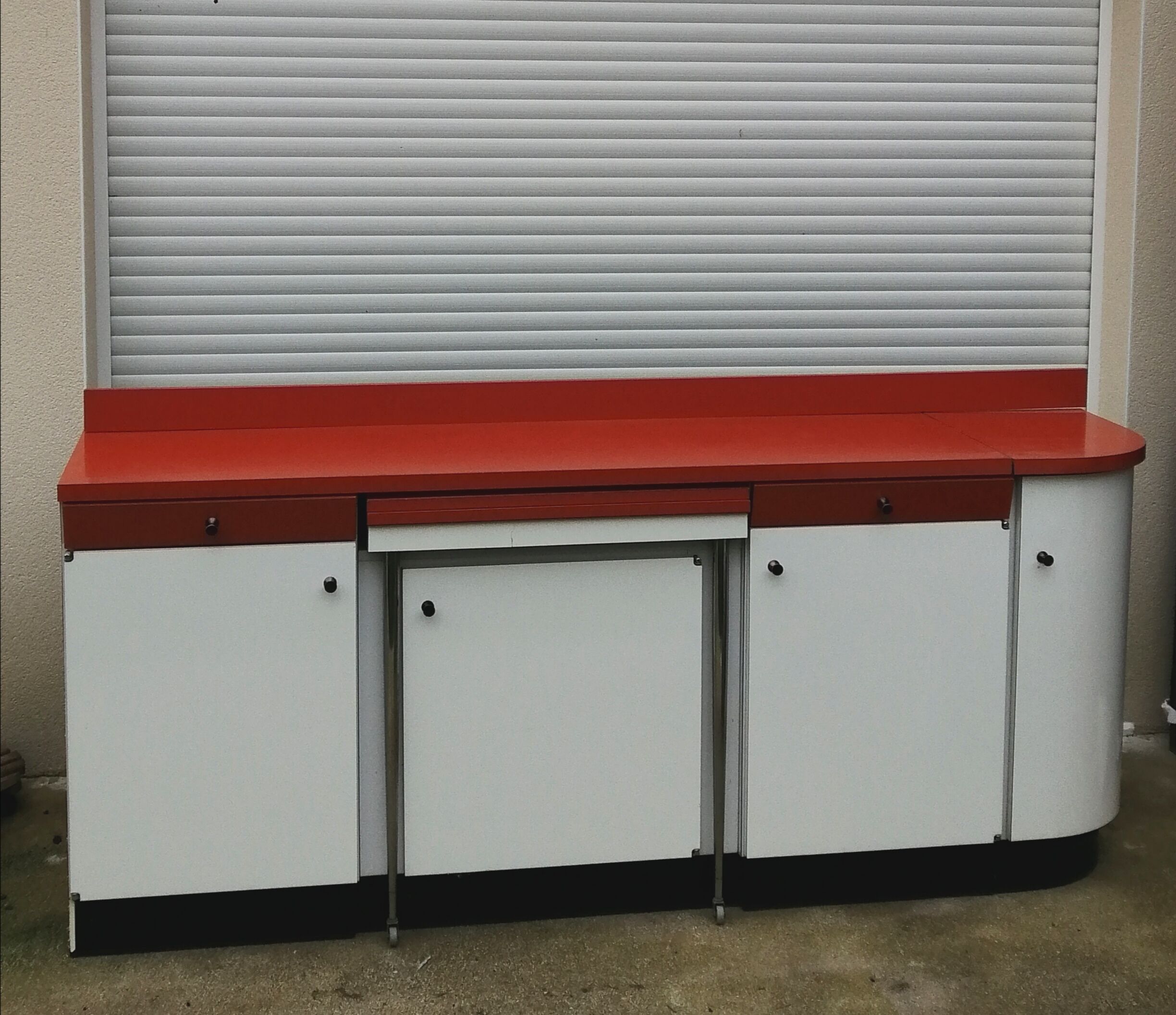 Formica sideboard with its 70' retractable table
