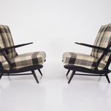 Paire de fauteuils laqués noirs 1950s