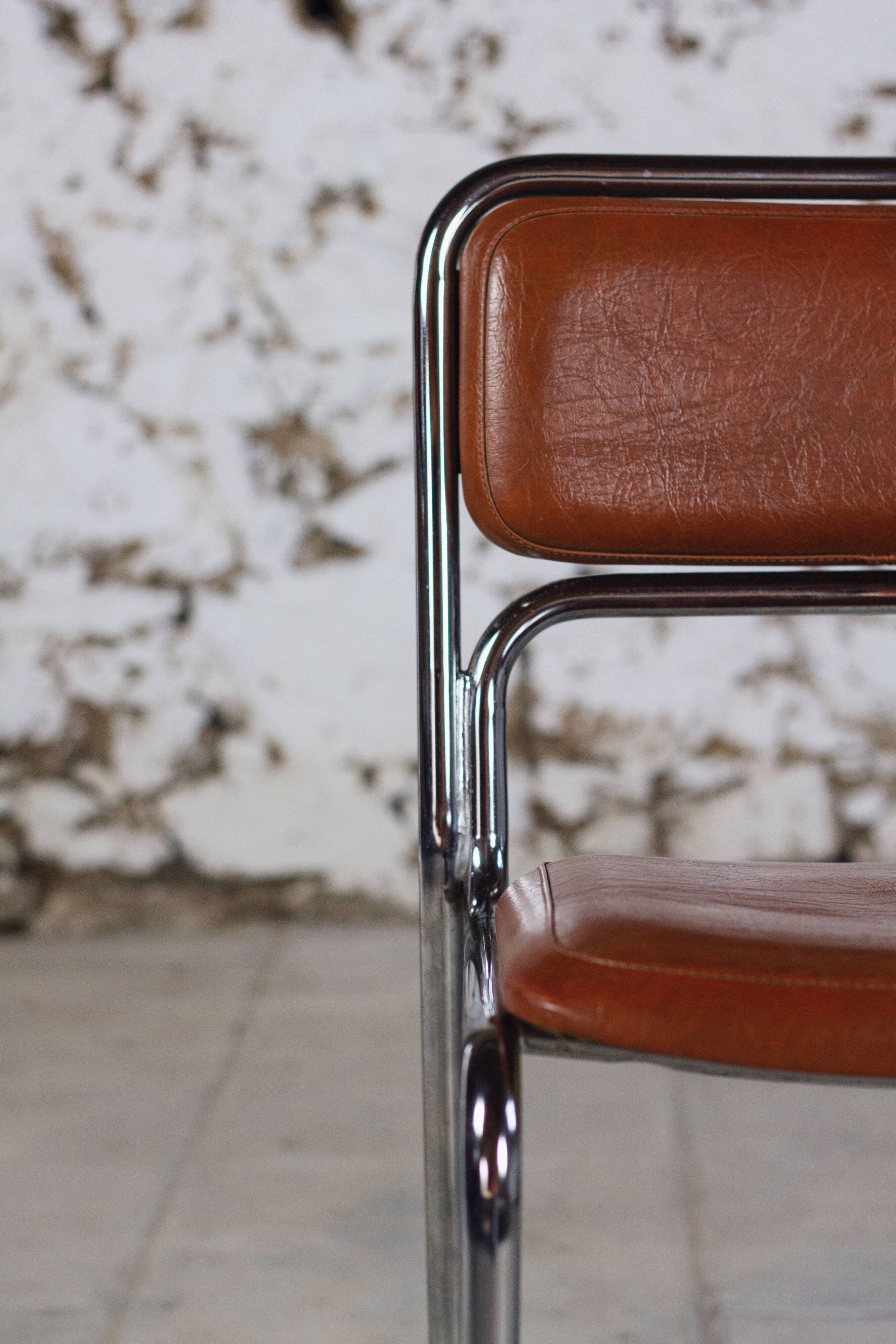 8 vintage tubular chrome and skai chairs, 1970