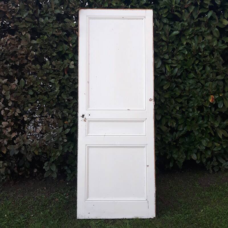 Communication door H220xW80.5cm, old panelled with moulding.