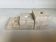 Trio of travertine candlesticks