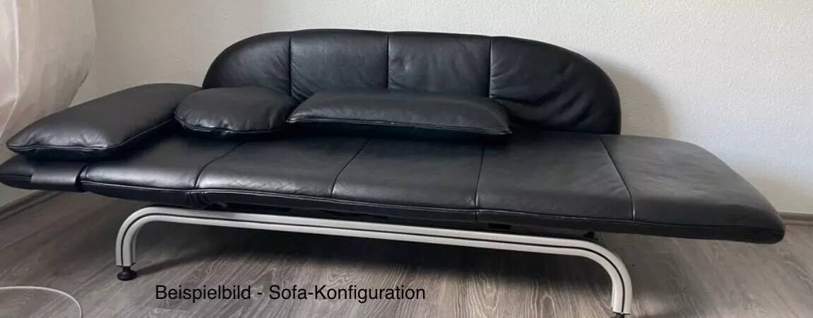 XDark brown leather chaise longue