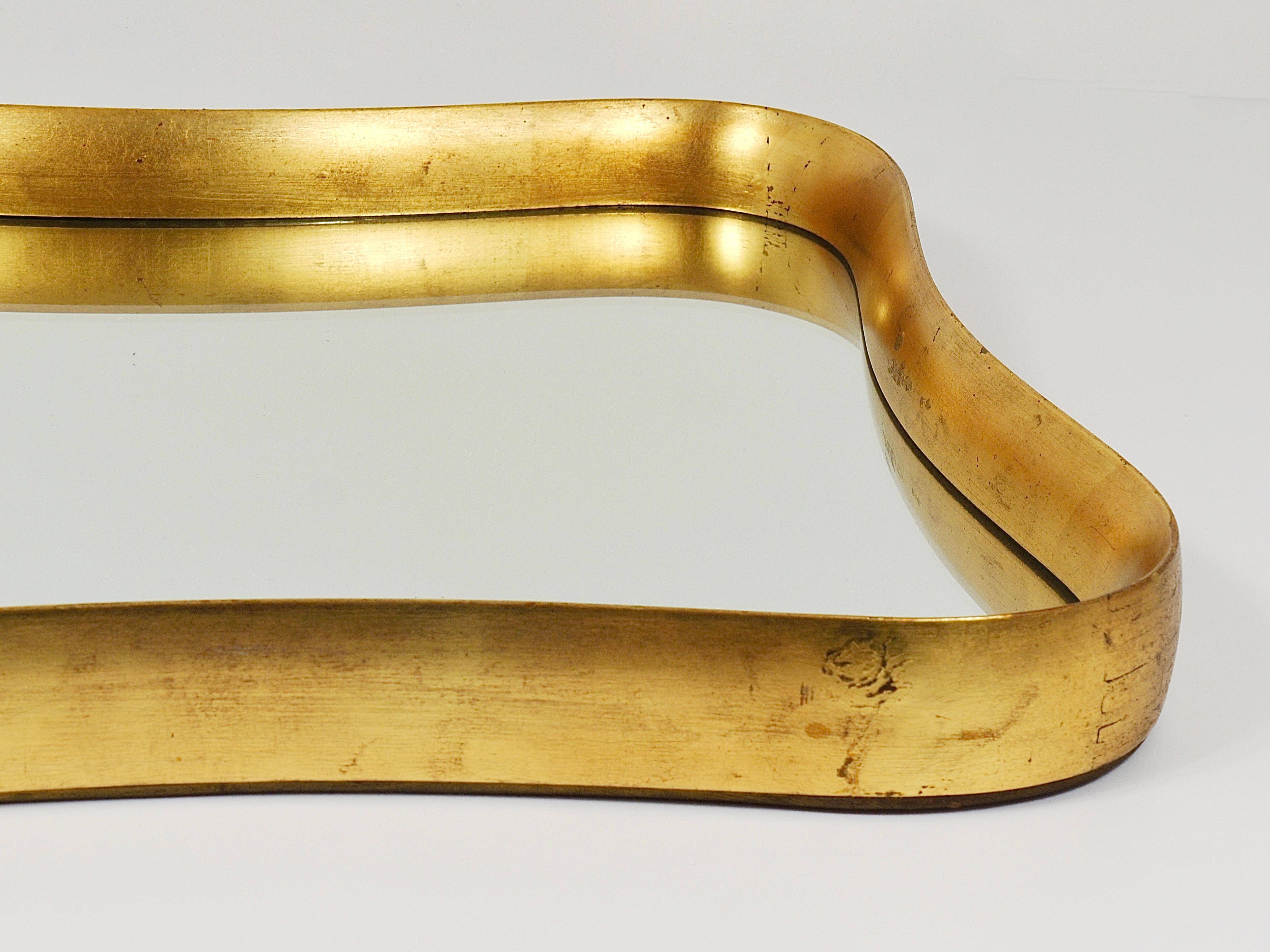 Golden wooden mirror in the style of Gio Ponti by Max Welz, Vienna, Austria, 1940s.