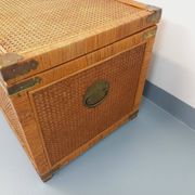 Vintage trunk in wood, rattan, caning, and brass.