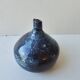Small blue soliflore vase in glazed ceramic signed X (to be identified)