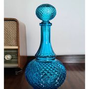 Bouteille en verre bleu belge vintage