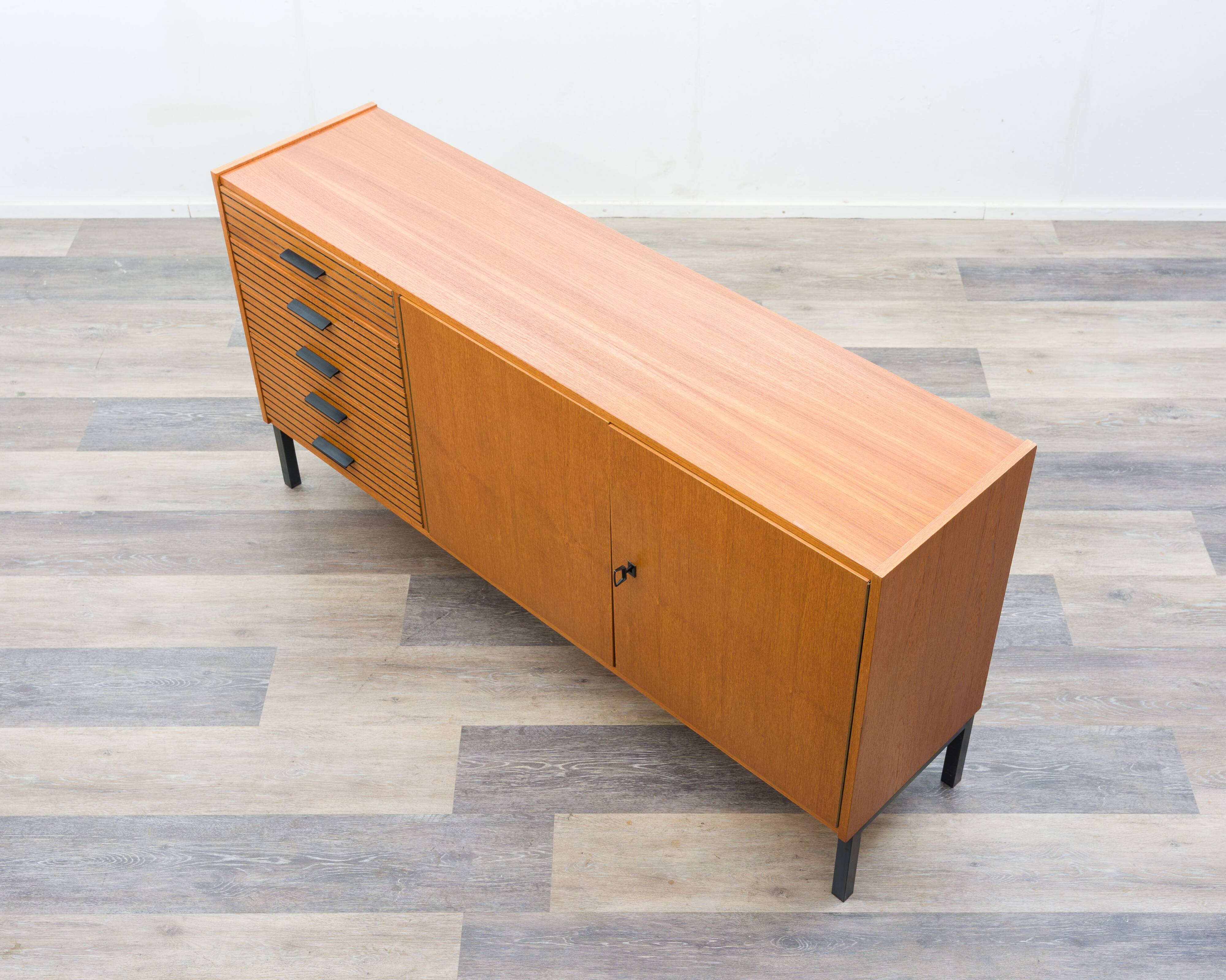 Teak sideboard with grooved drawers, 1960s.