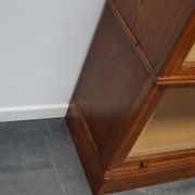German oak bookcase with folding doors, ca 1900