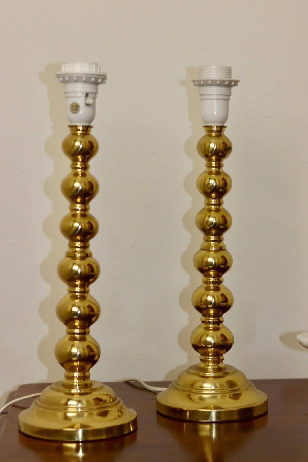 Pair of Swedish brass lamps from the mid-century.