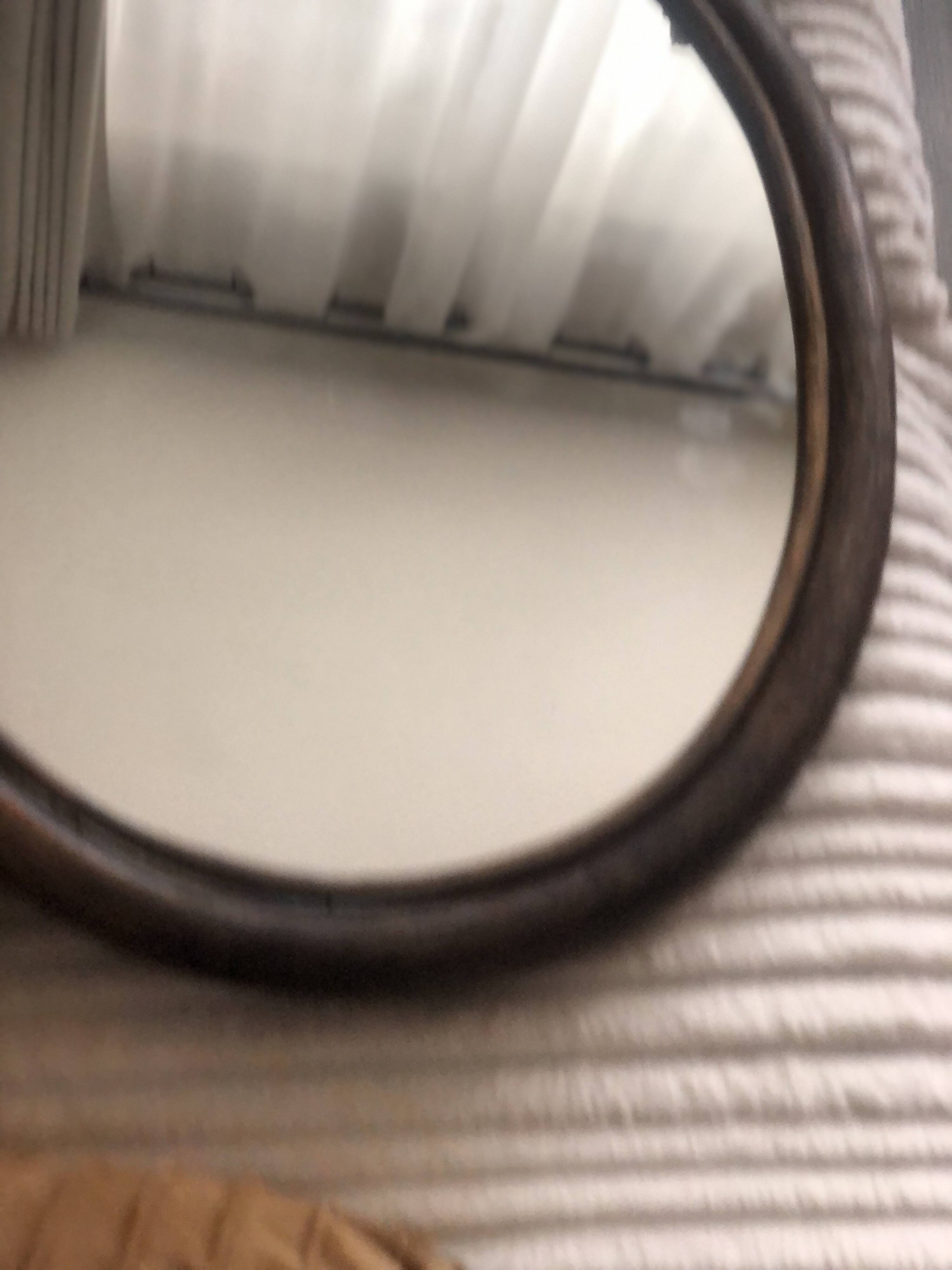 Oval rattan mirror