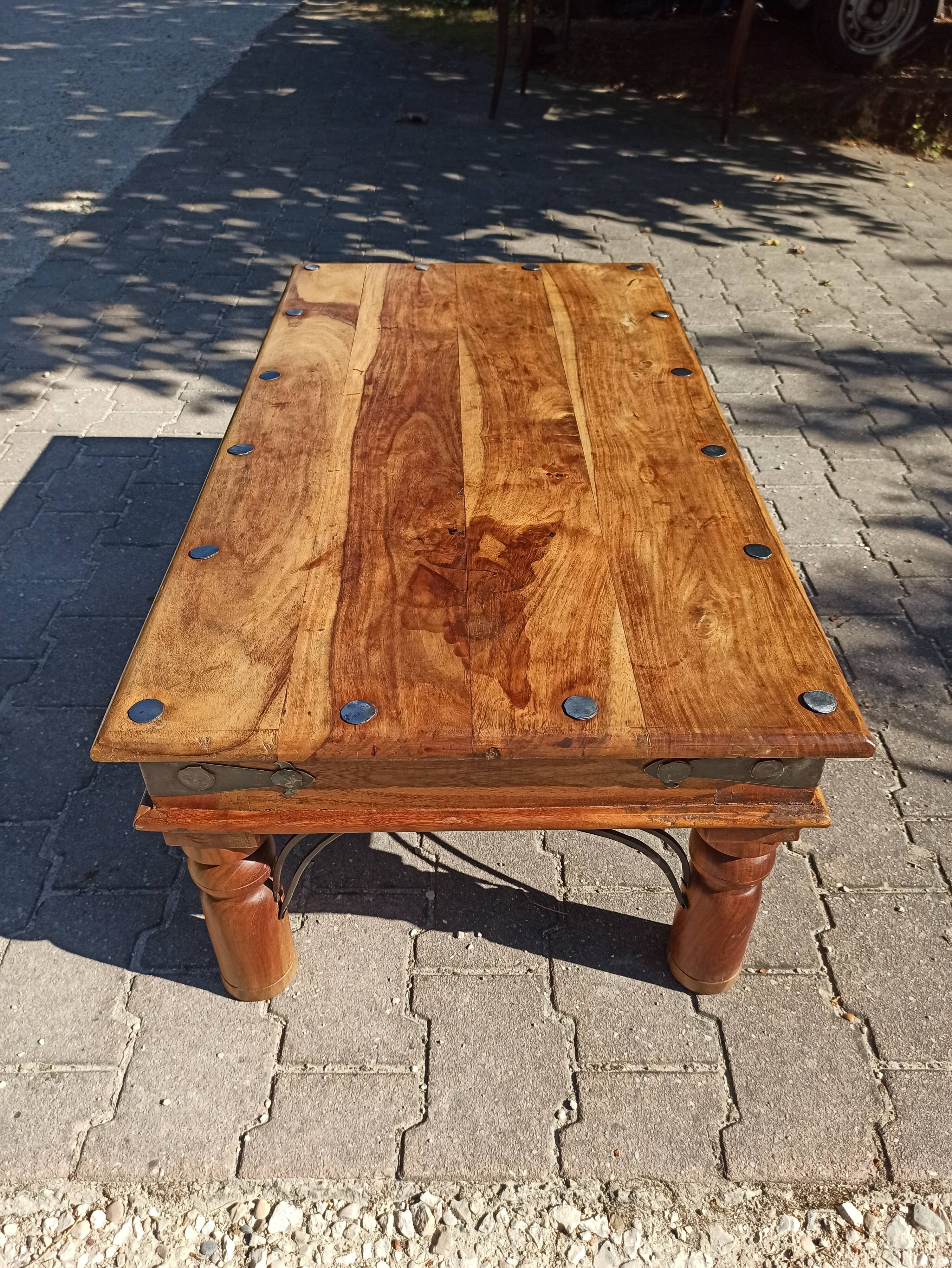 Medieval-inspired red oak coffee table with ironwork