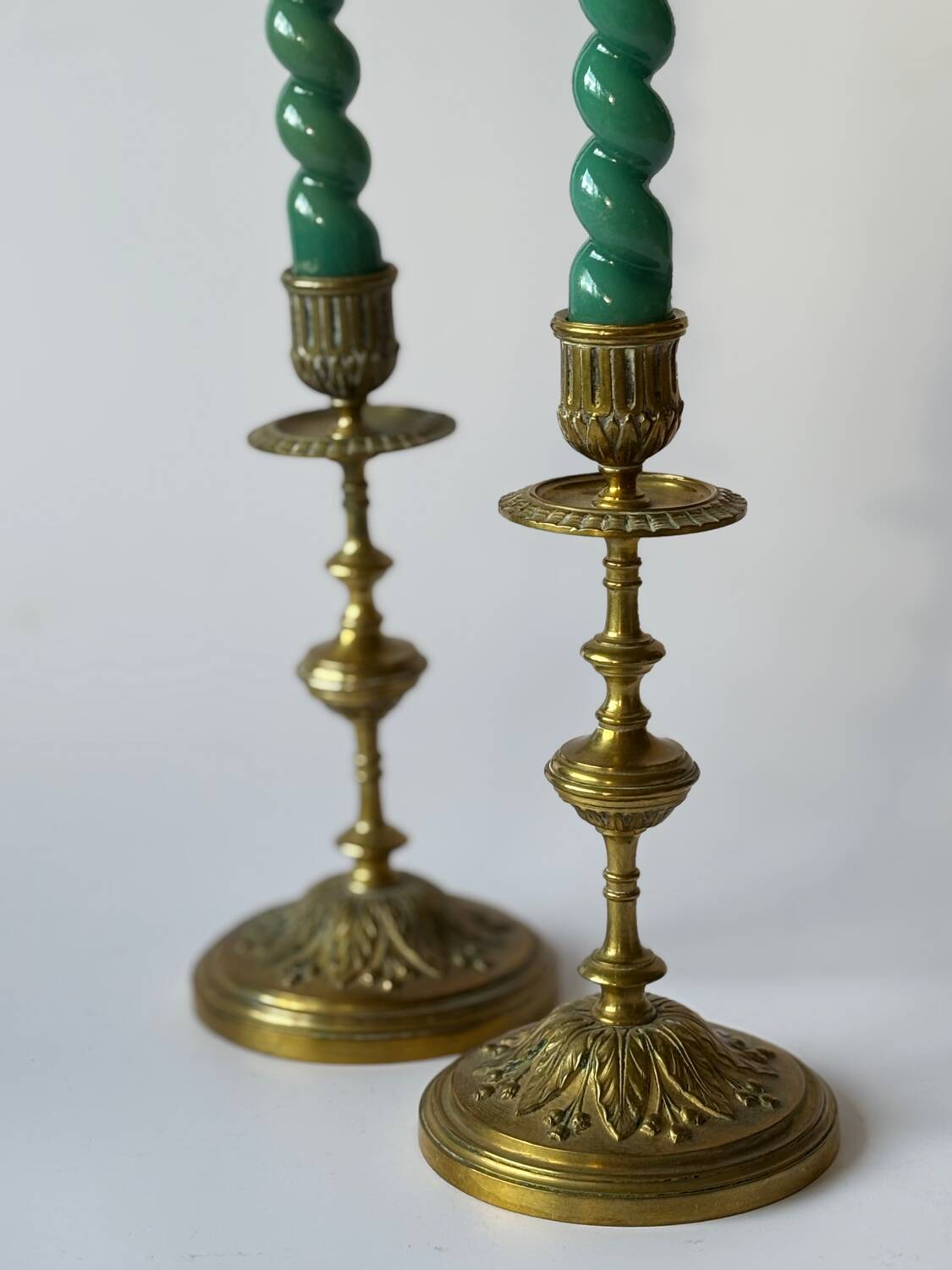 Pair of neoclassical brass candlesticks