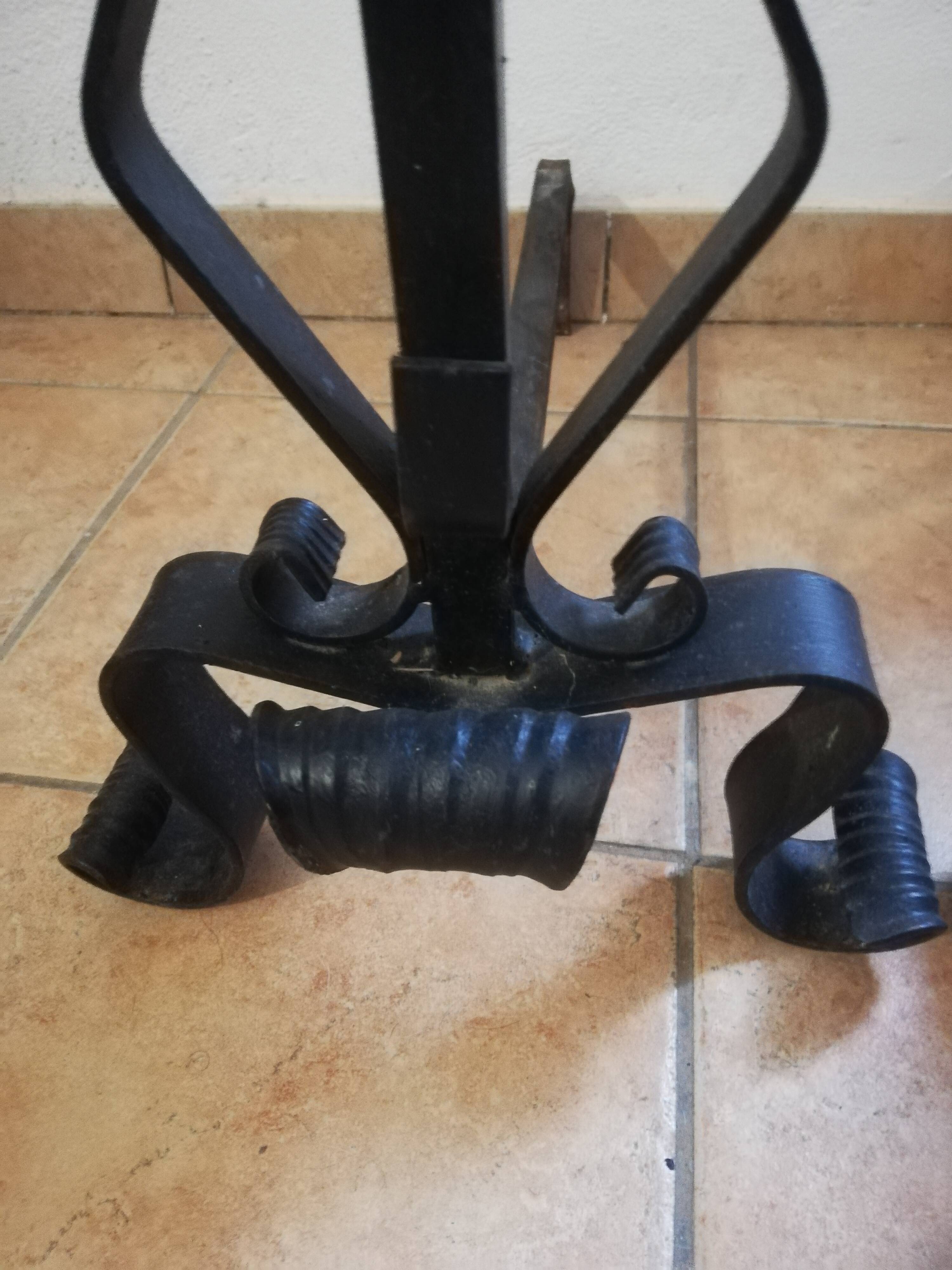 Pair of wrought iron andirons and brass ball.