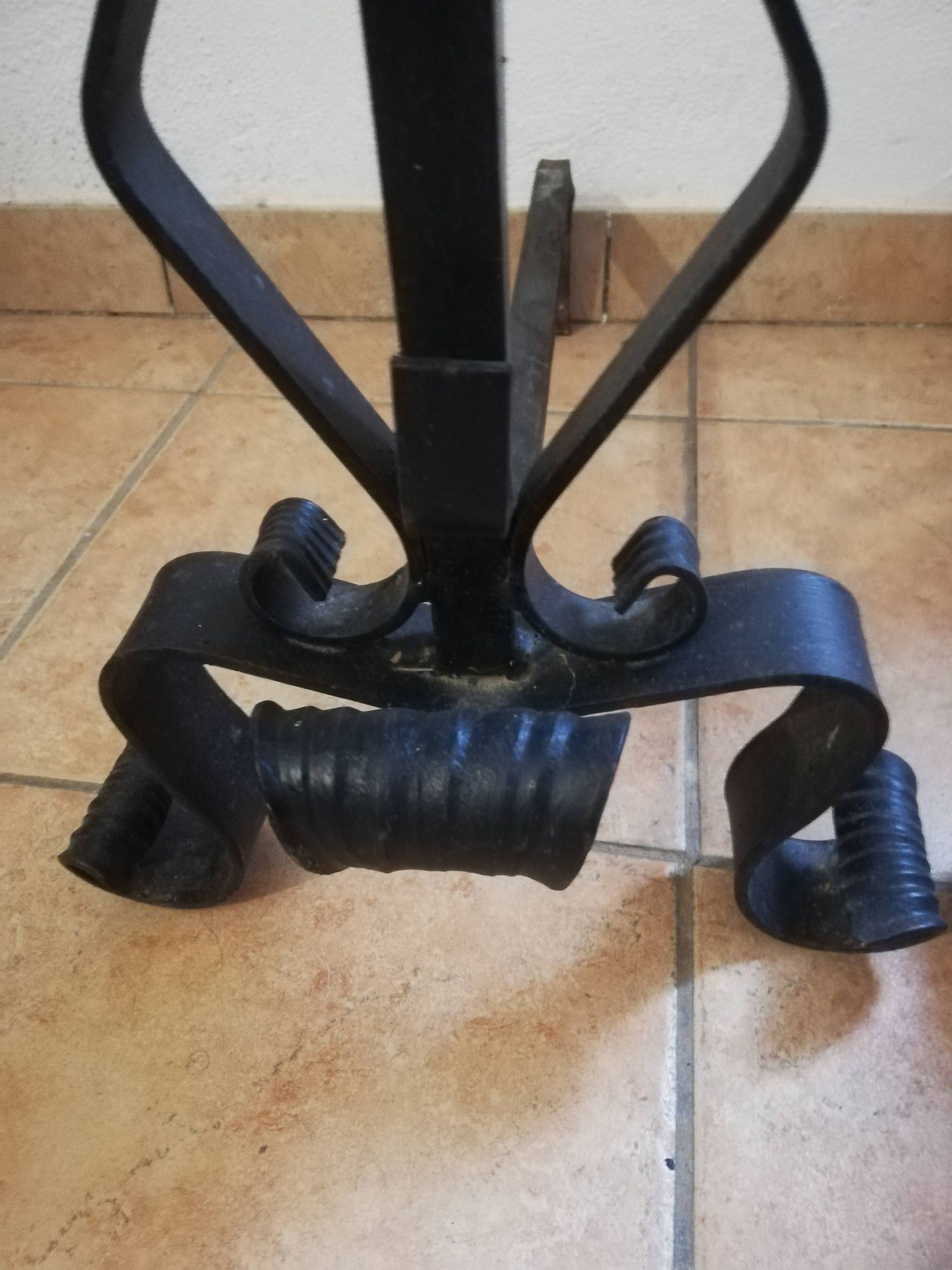 Pair of wrought iron andirons and brass ball.