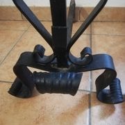 Pair of wrought iron andirons and brass ball.