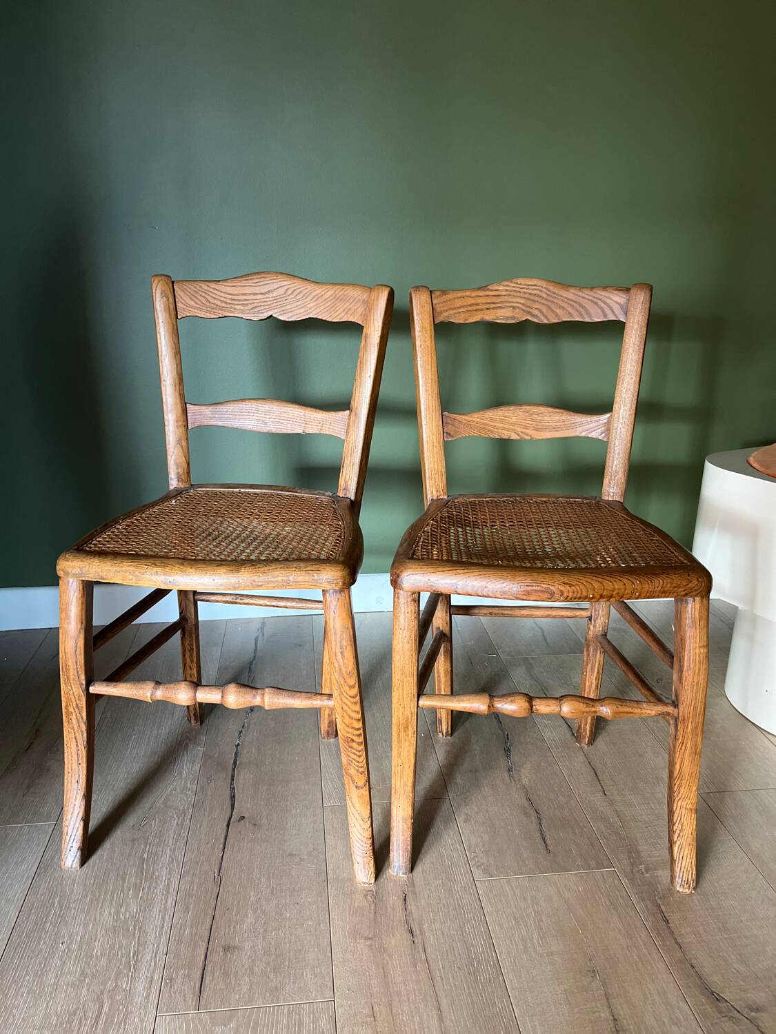 Pair of vintage chairs from the late 20th century with caning.