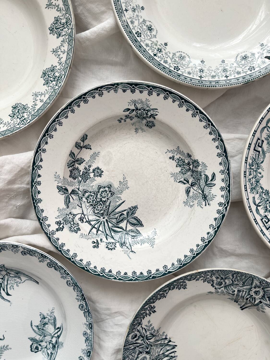 6 mismatched Saint Amand ironstone soup plates