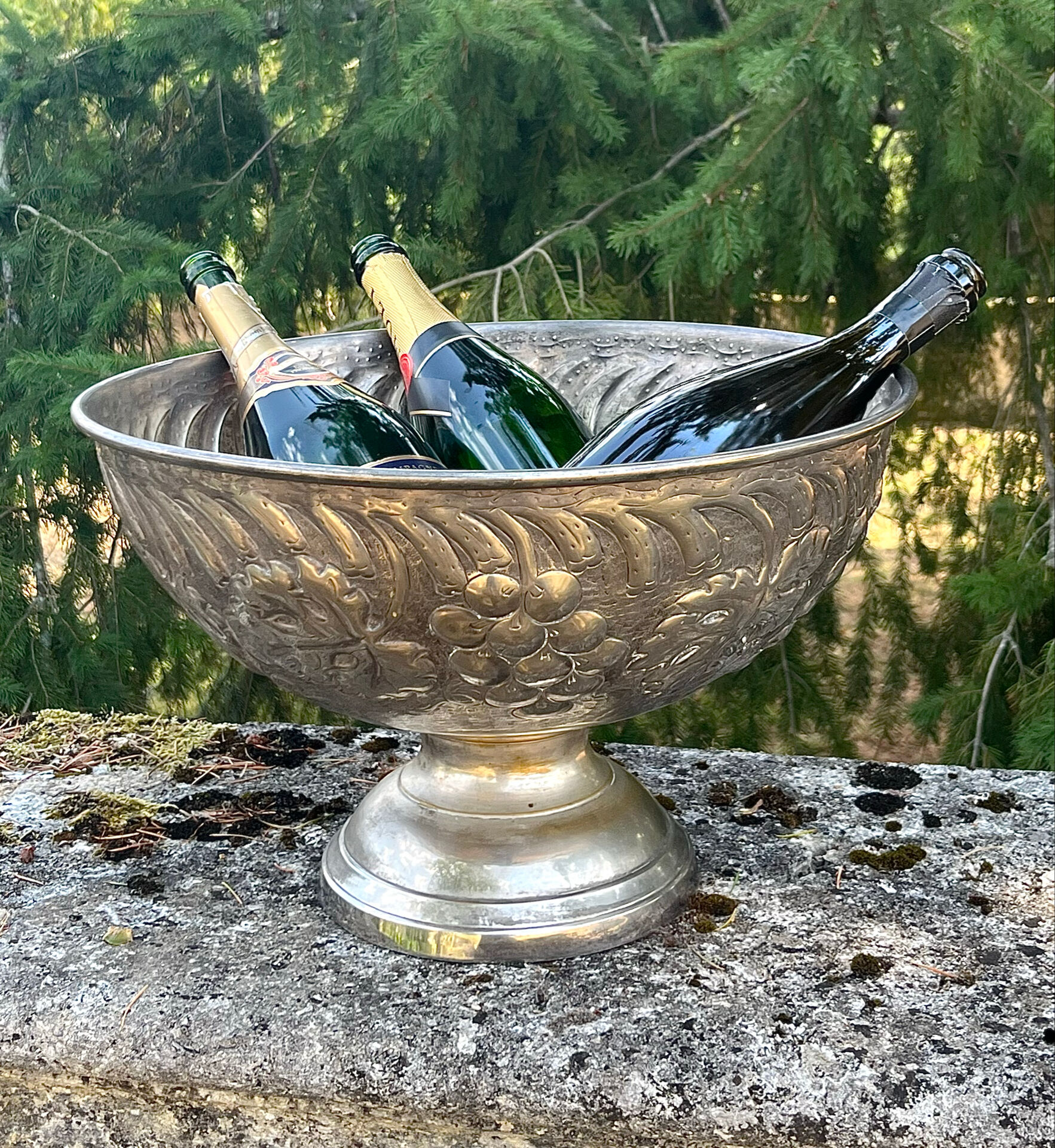 Large silver plated champagne cooler bowl on pedestal with grape
