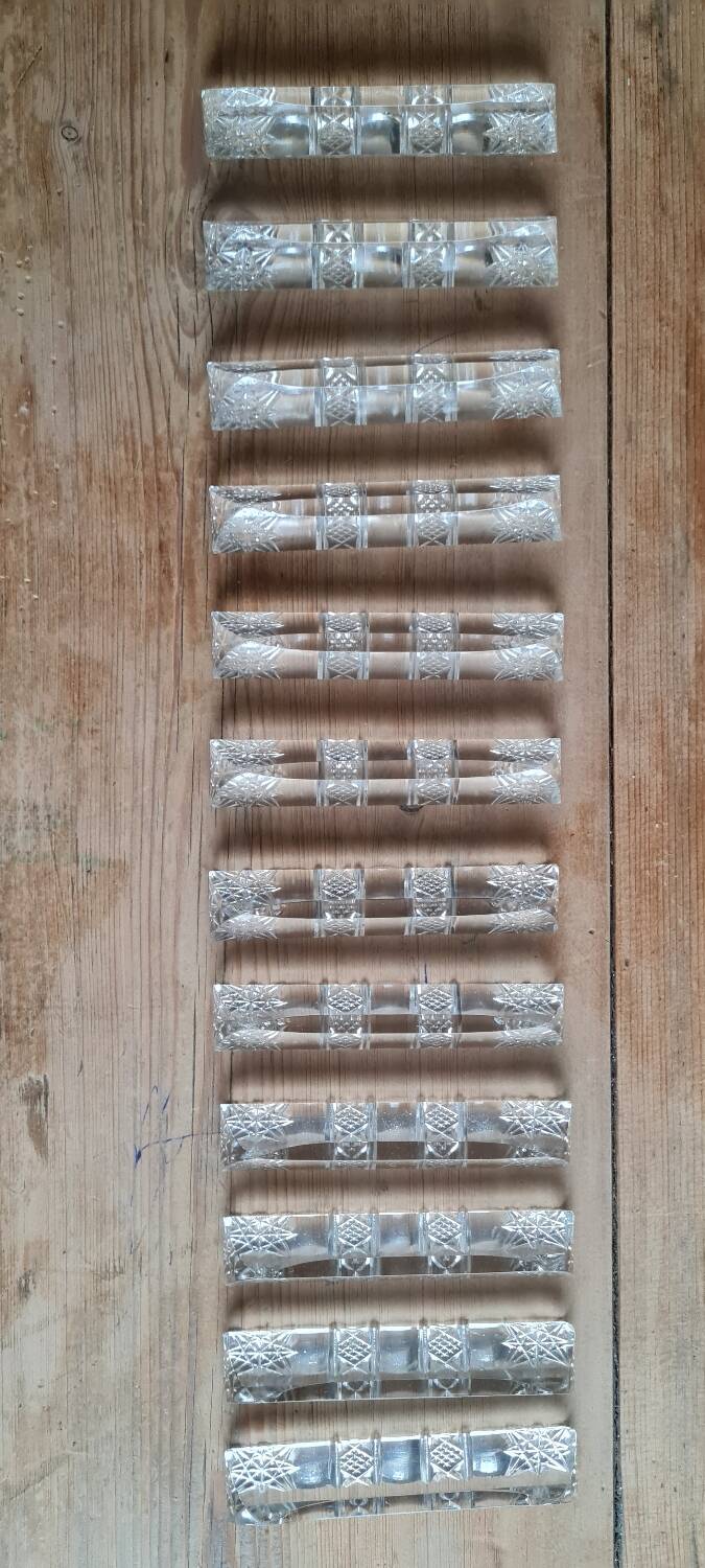 Set of 12 chiseled crystal knife holders