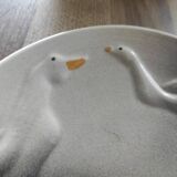Plate with 3 ducks / geese in relief - Faïencerie de la Linde, France