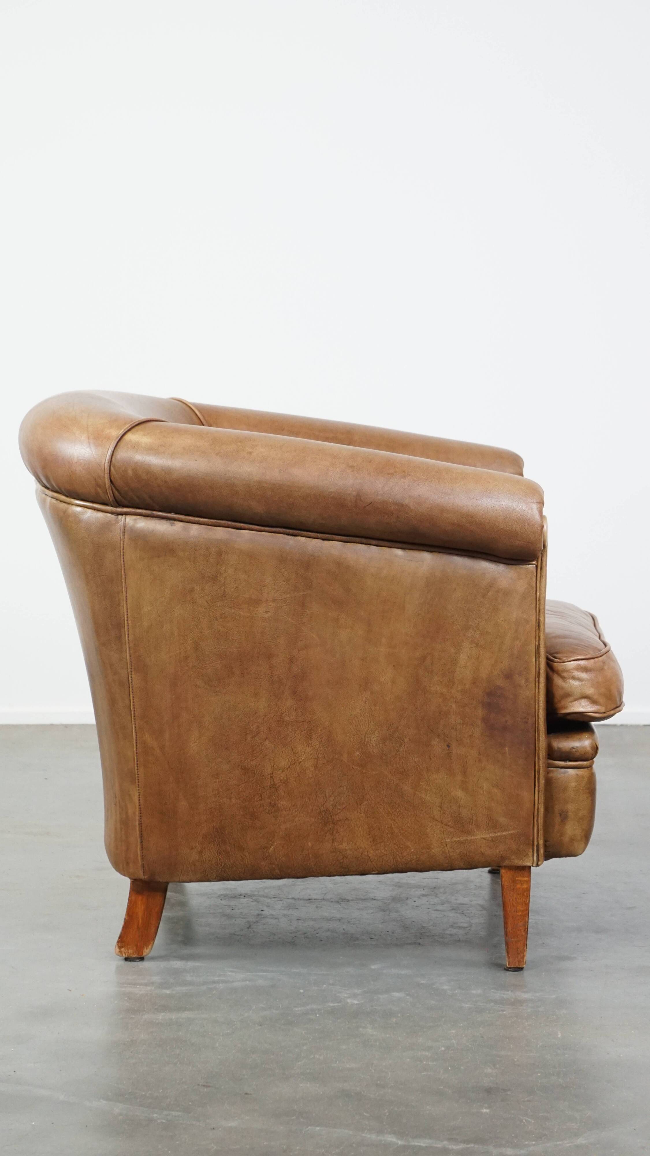 Fauteuil club en cuir de vachette couleur cognac clair