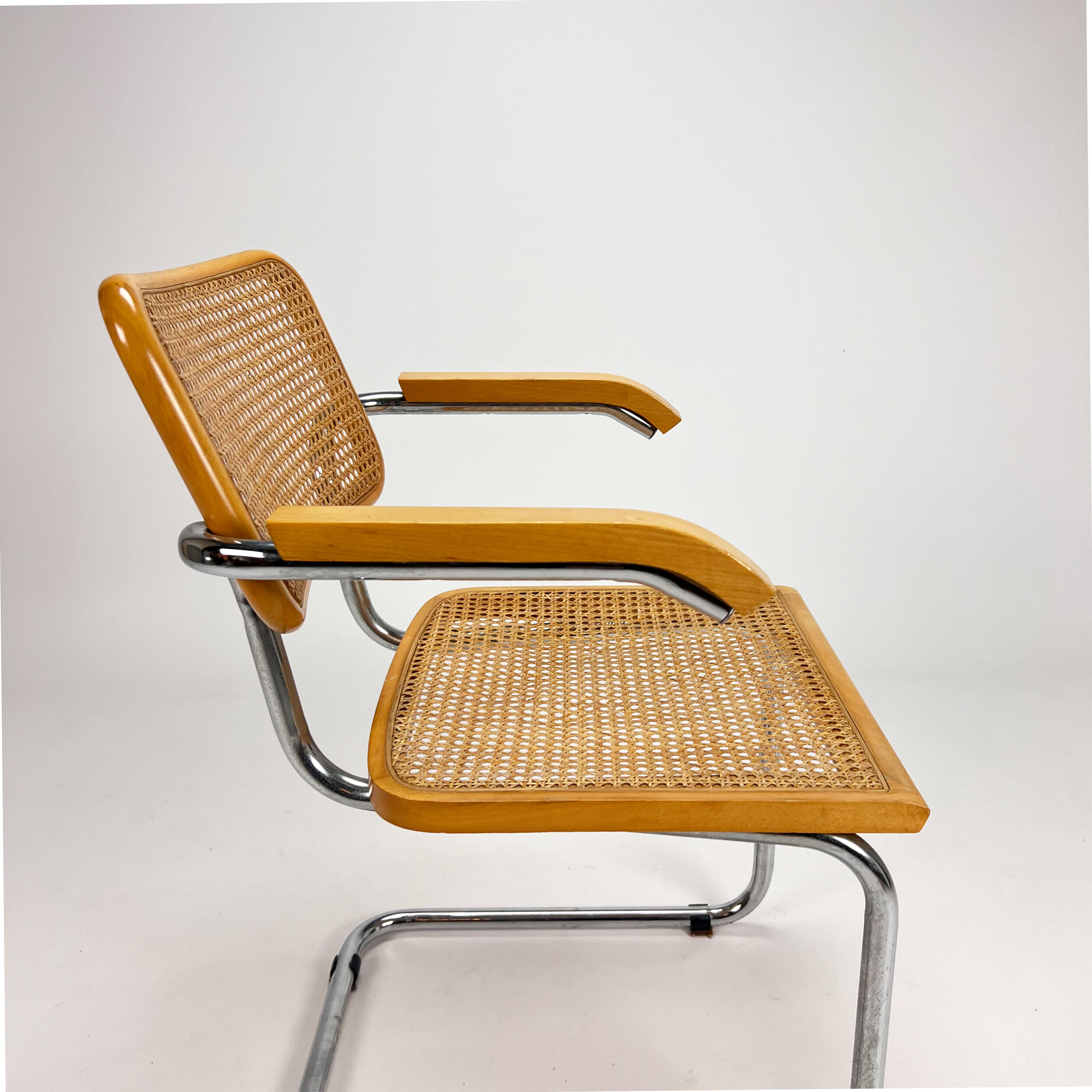 Tubular frame and cane cantilever dining chair, italy, 1970s