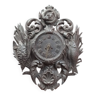 Cartel hunting clock in cast iron Black Forest