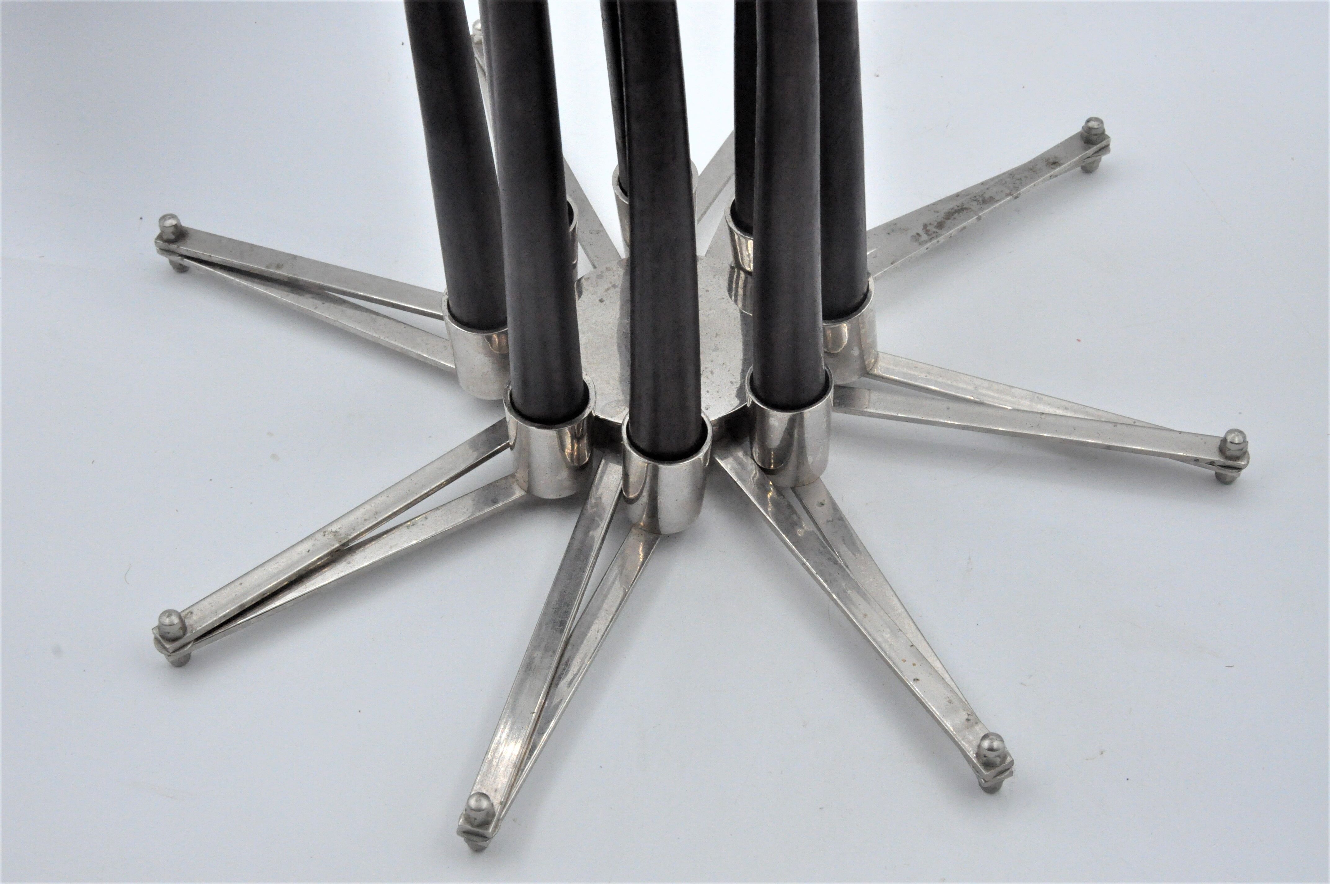 Design candle holder in silver metal, with 8 candles, modular spider