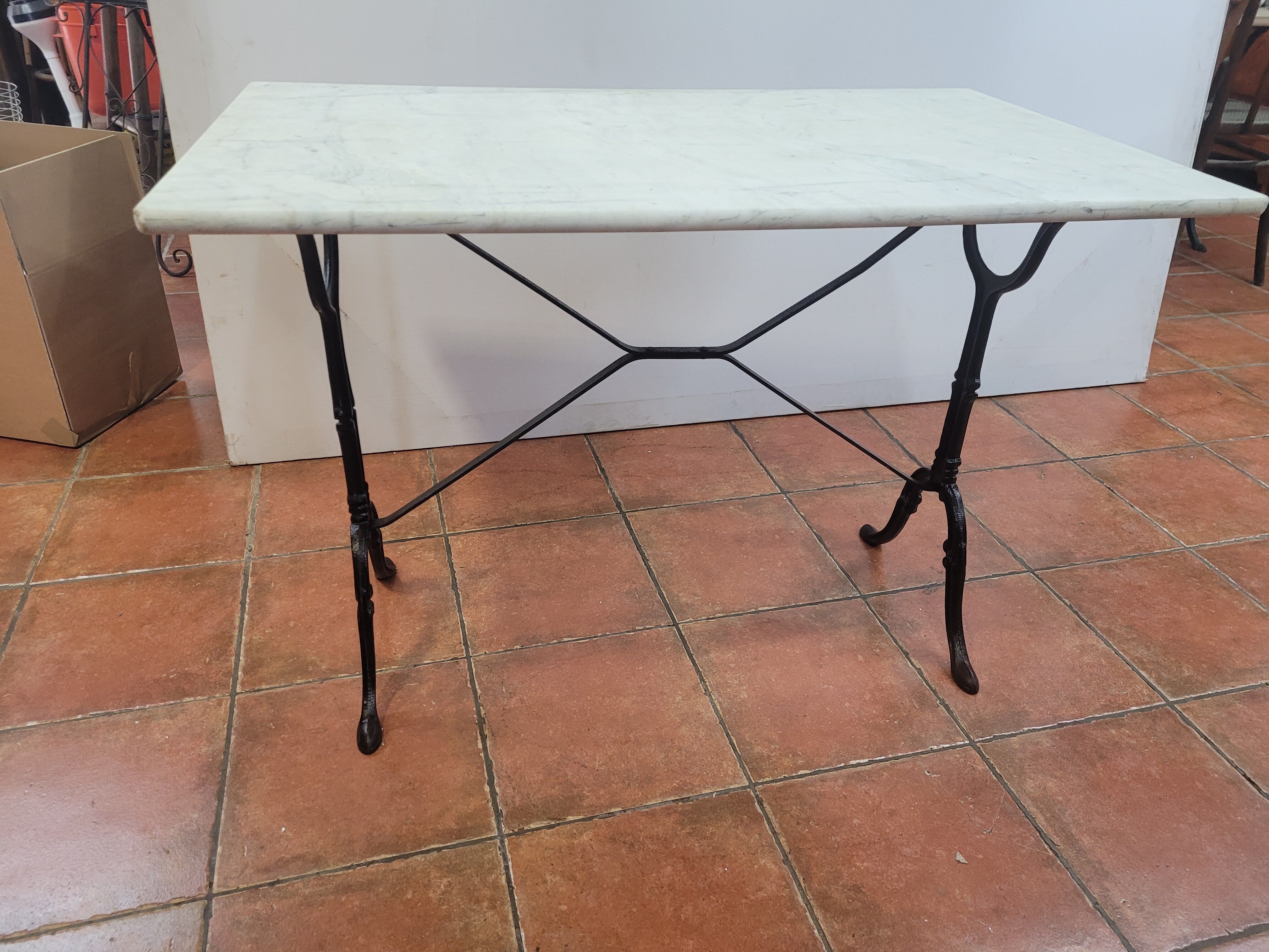 Bistro table base cast iron over marble