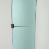 Two-tone glass and gilded brass console mirror. Circa 1950.