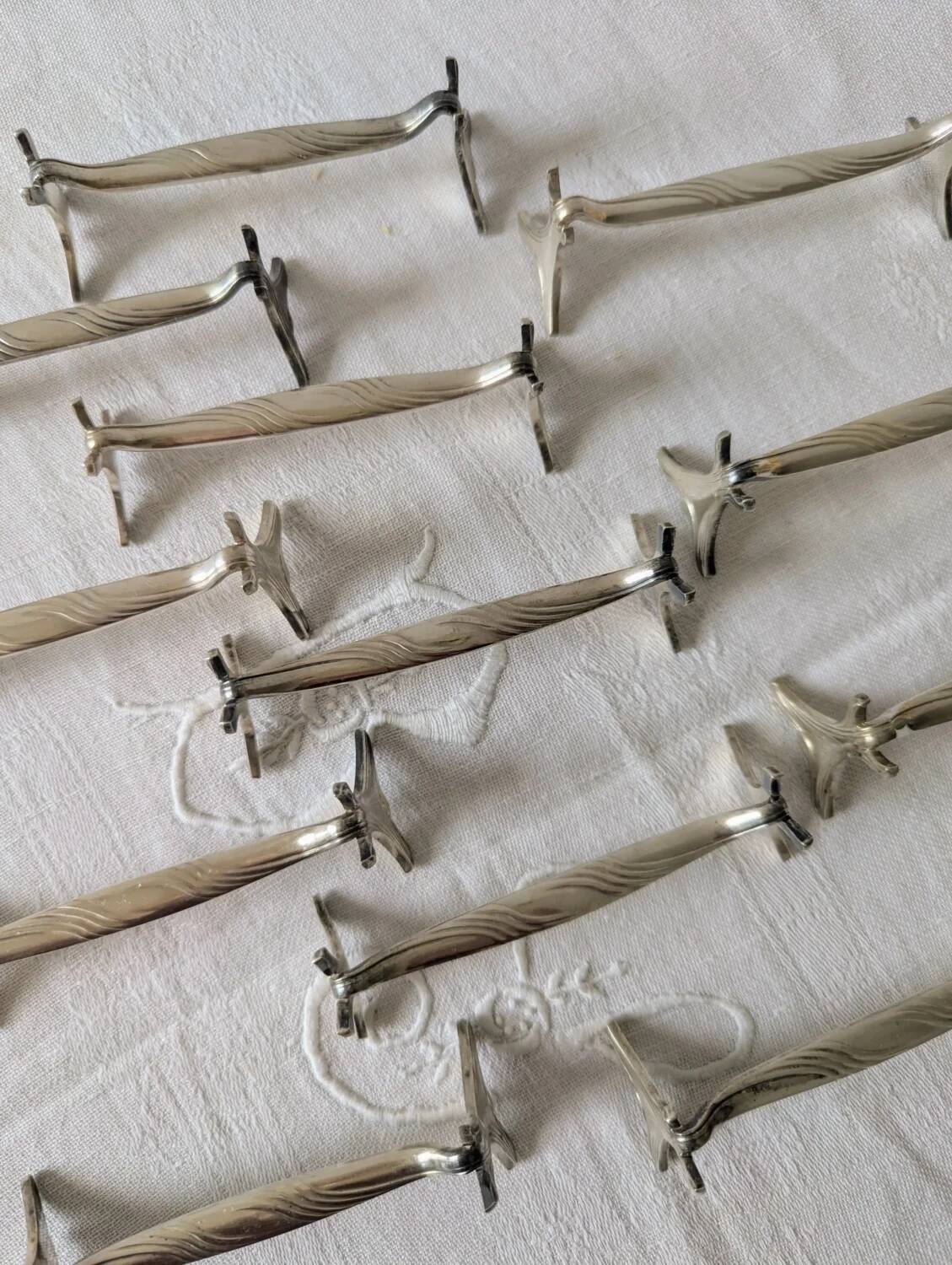 Set of 12 Christofle knife rests, Moderne 1912 model