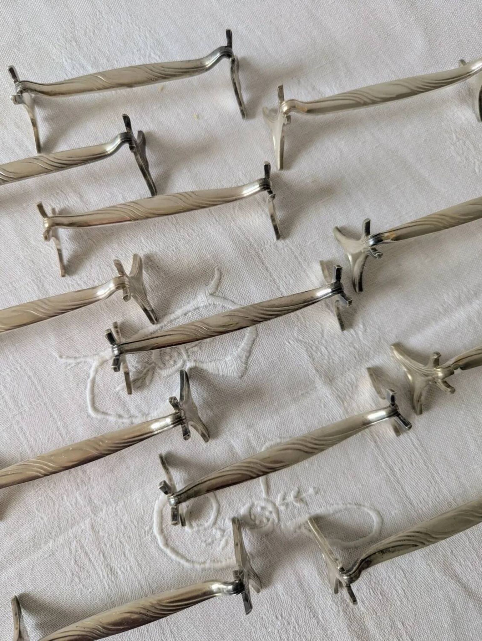 Set of 12 Christofle knife rests, Moderne 1912 model
