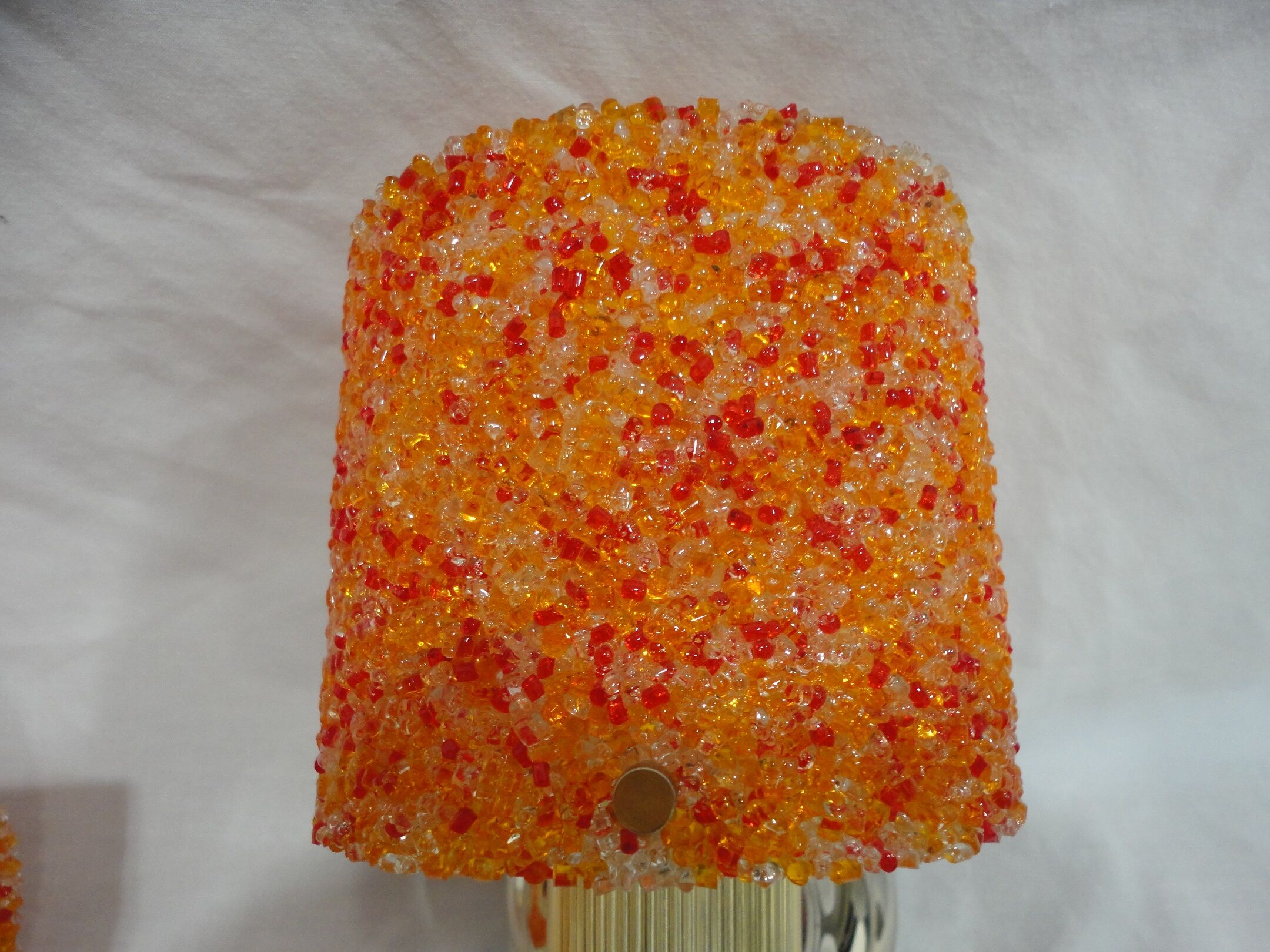 Pair of vintage applique in orange and brass perspex