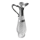 Diamond-point molded glass ewer, silver-plated metal.