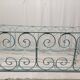 Old children's bed with metal bars