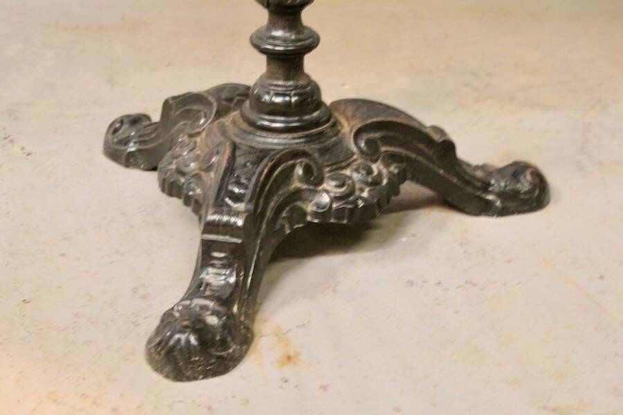Bistro table with cast iron base