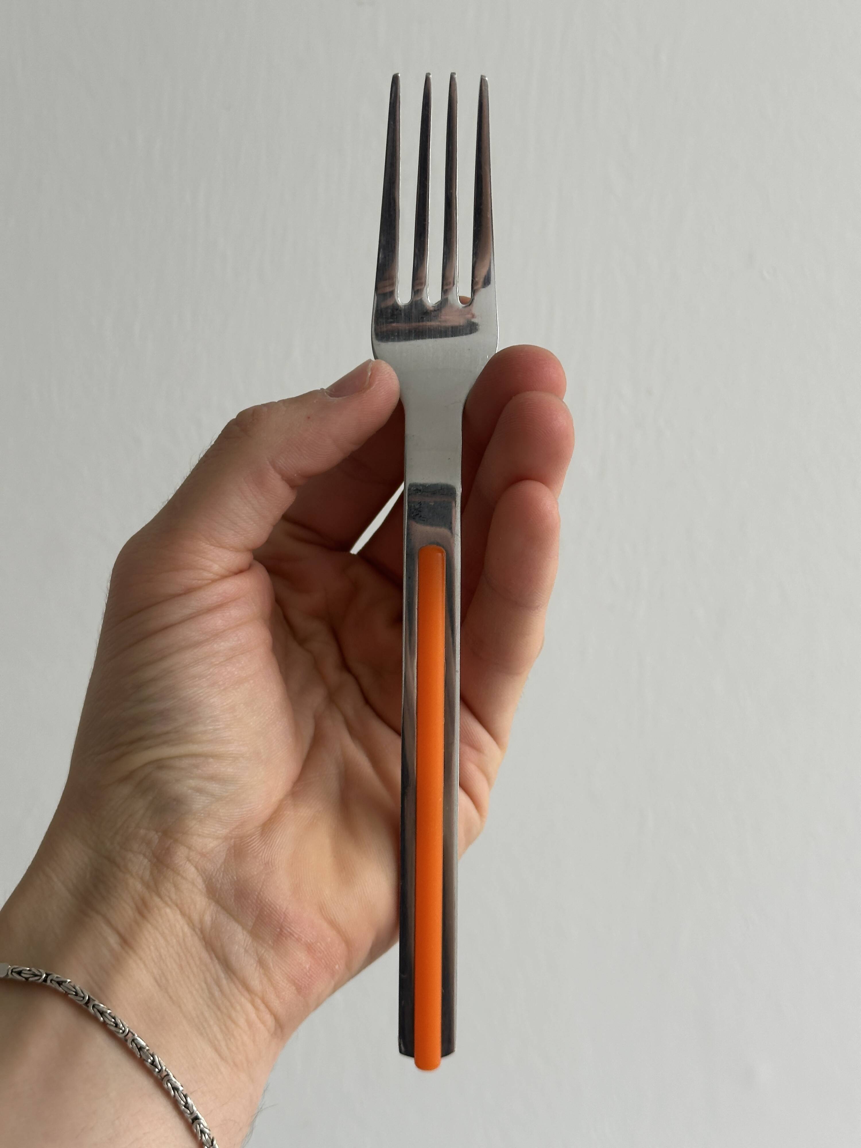 24 vintage stainless steel and orange plastic cutlery sets