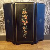 Old fireplace screen in painted sheet metal