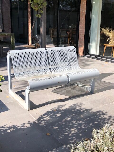 Perforated metal garden bench