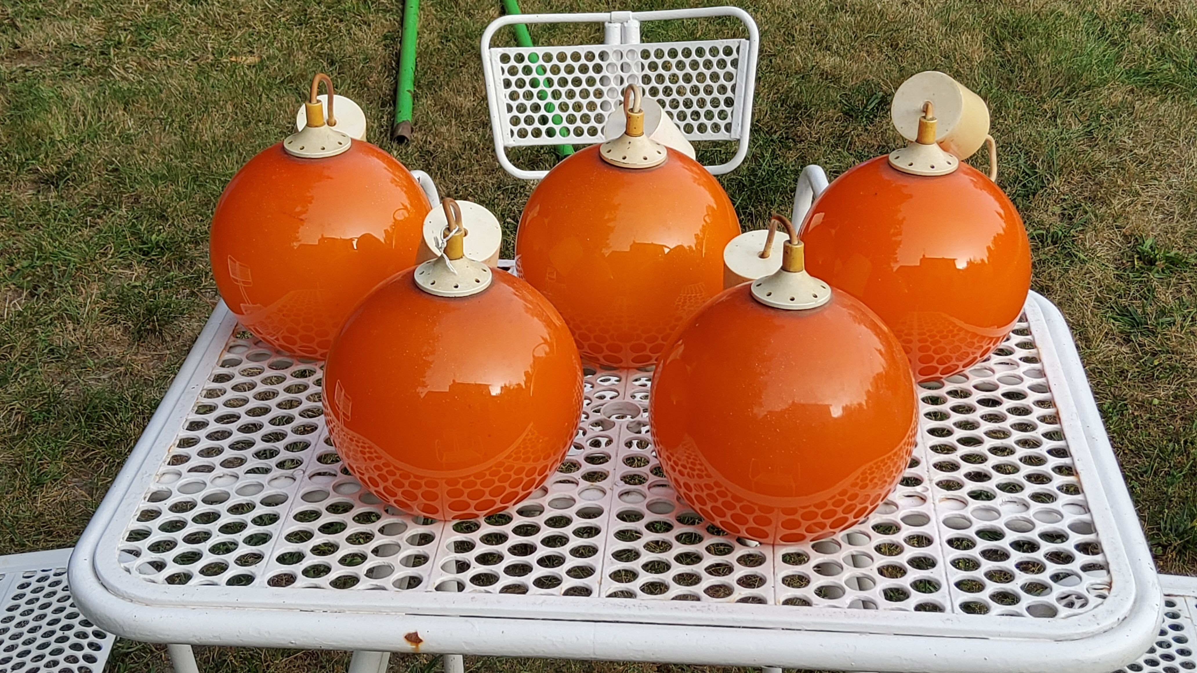 Set of 5 orange glass ball pendants from the 70s