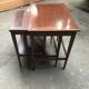 Brass-ringed mahogany gigognes tables