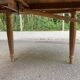 Art Deco round extendable dining table stripped in solid walnut from the 1920s.