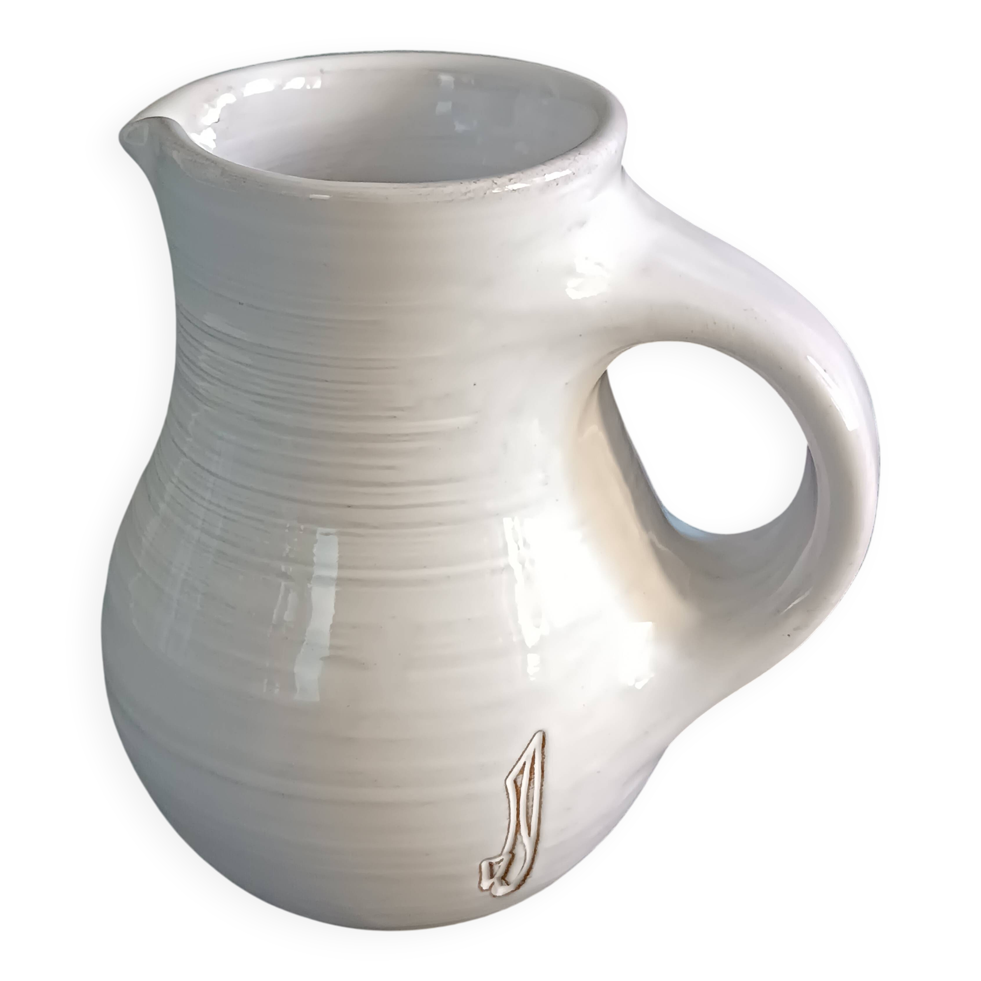Vintage white glazed ceramic pitcher signed