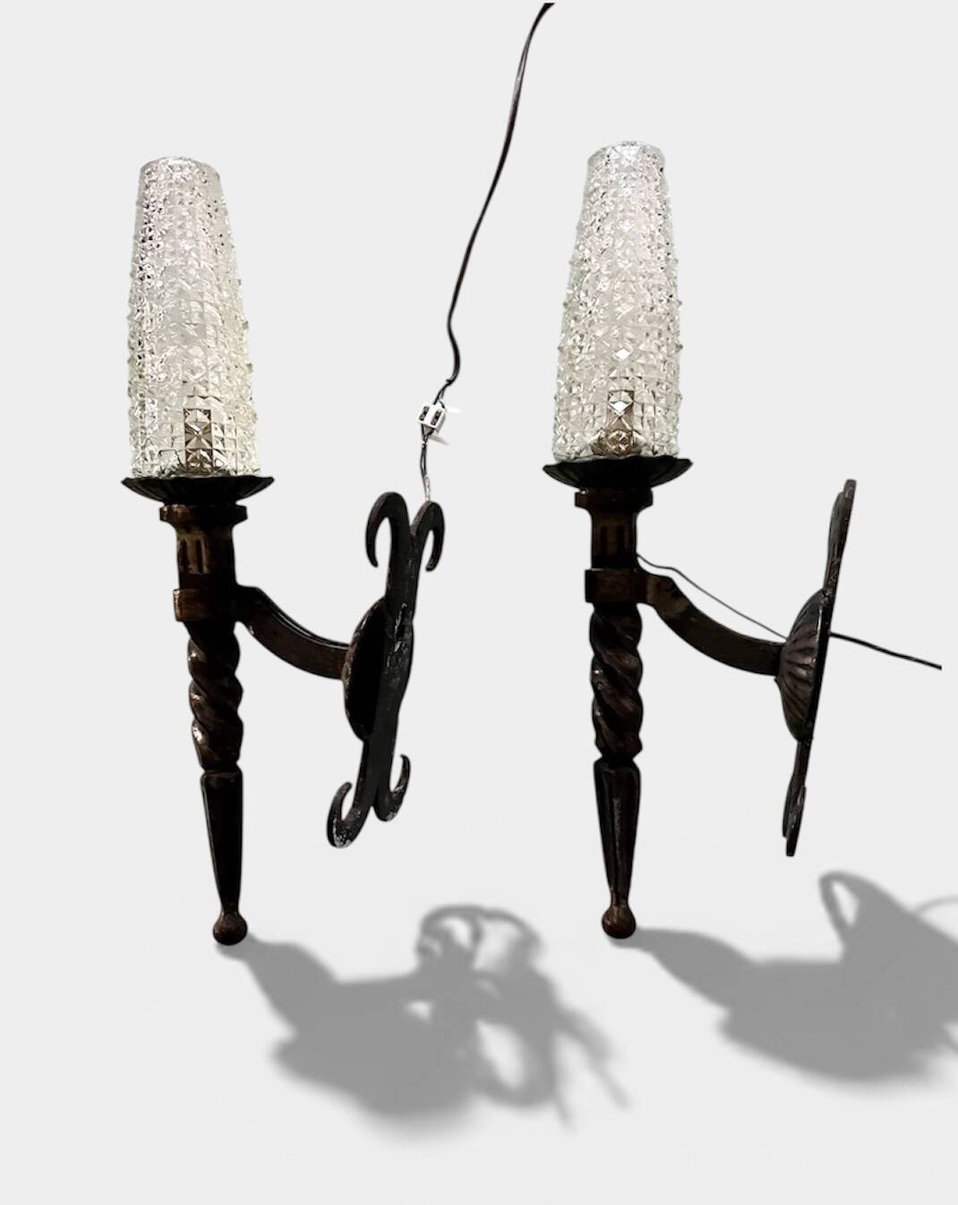 Pair of brutalist wall sconces in wrought iron