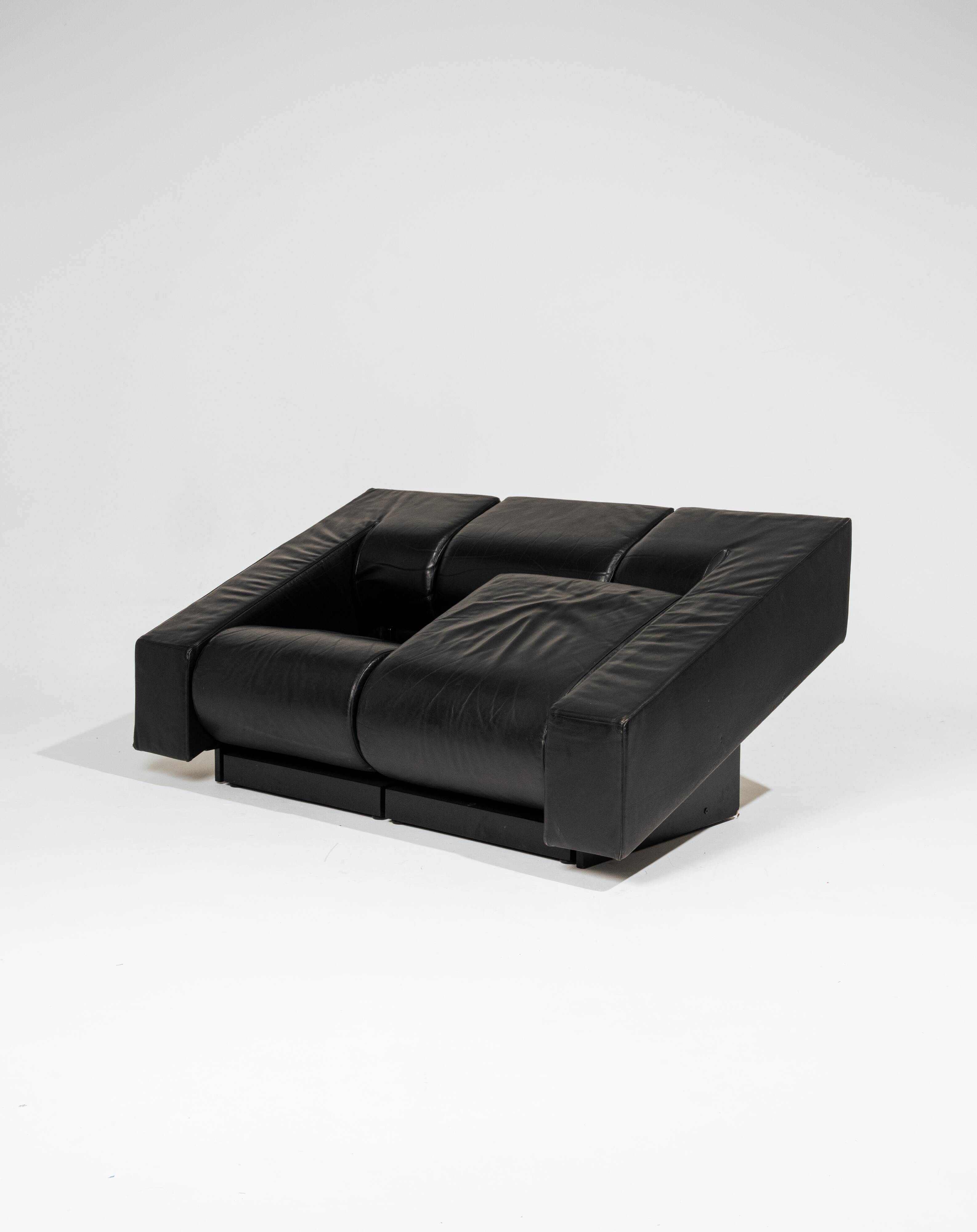 Obliqua two-seater leather sofa, Mario Botta, 1980s