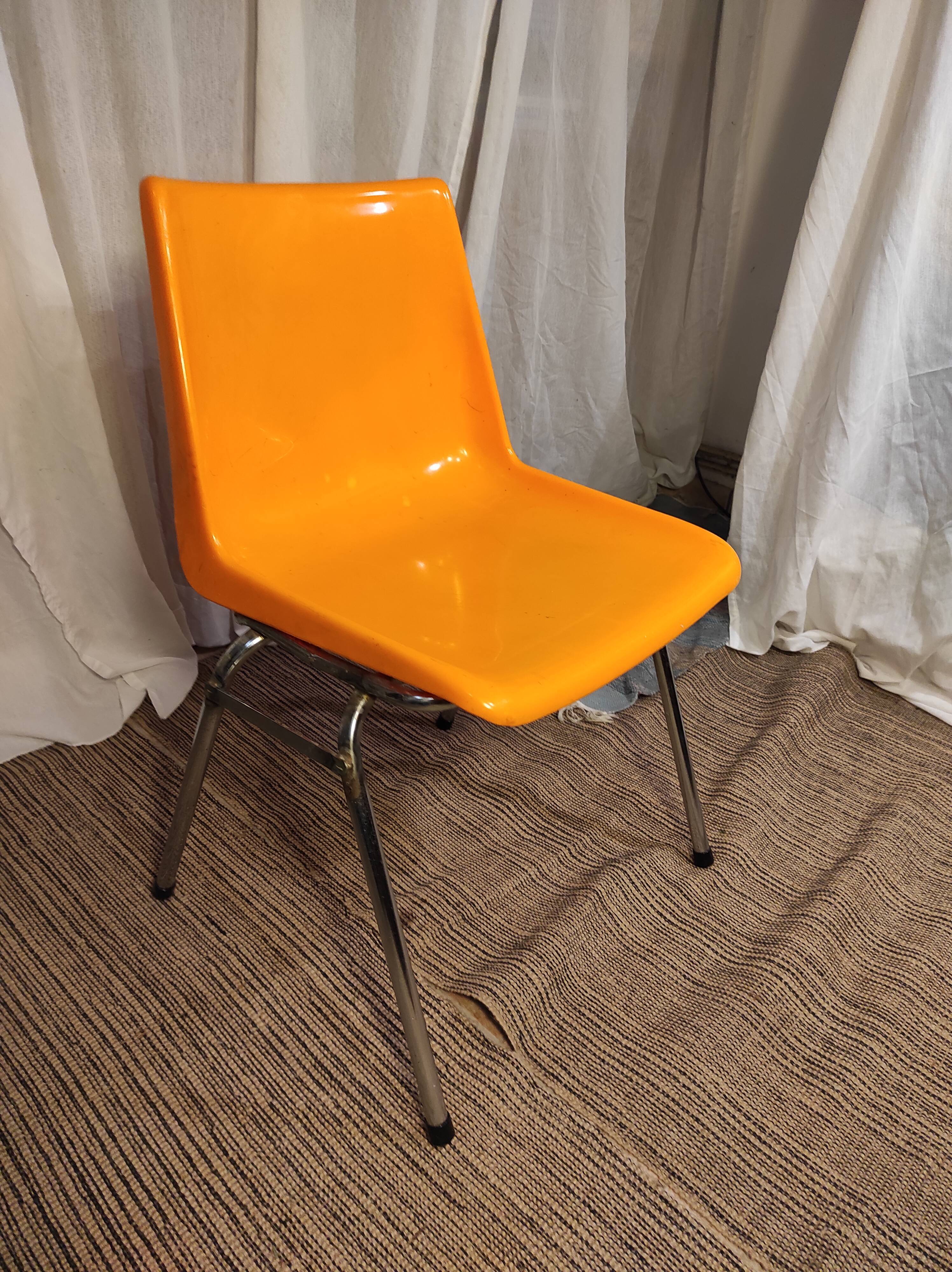 Orange plastic chair 1970
