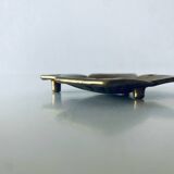 Empty pocket square of aces in brass