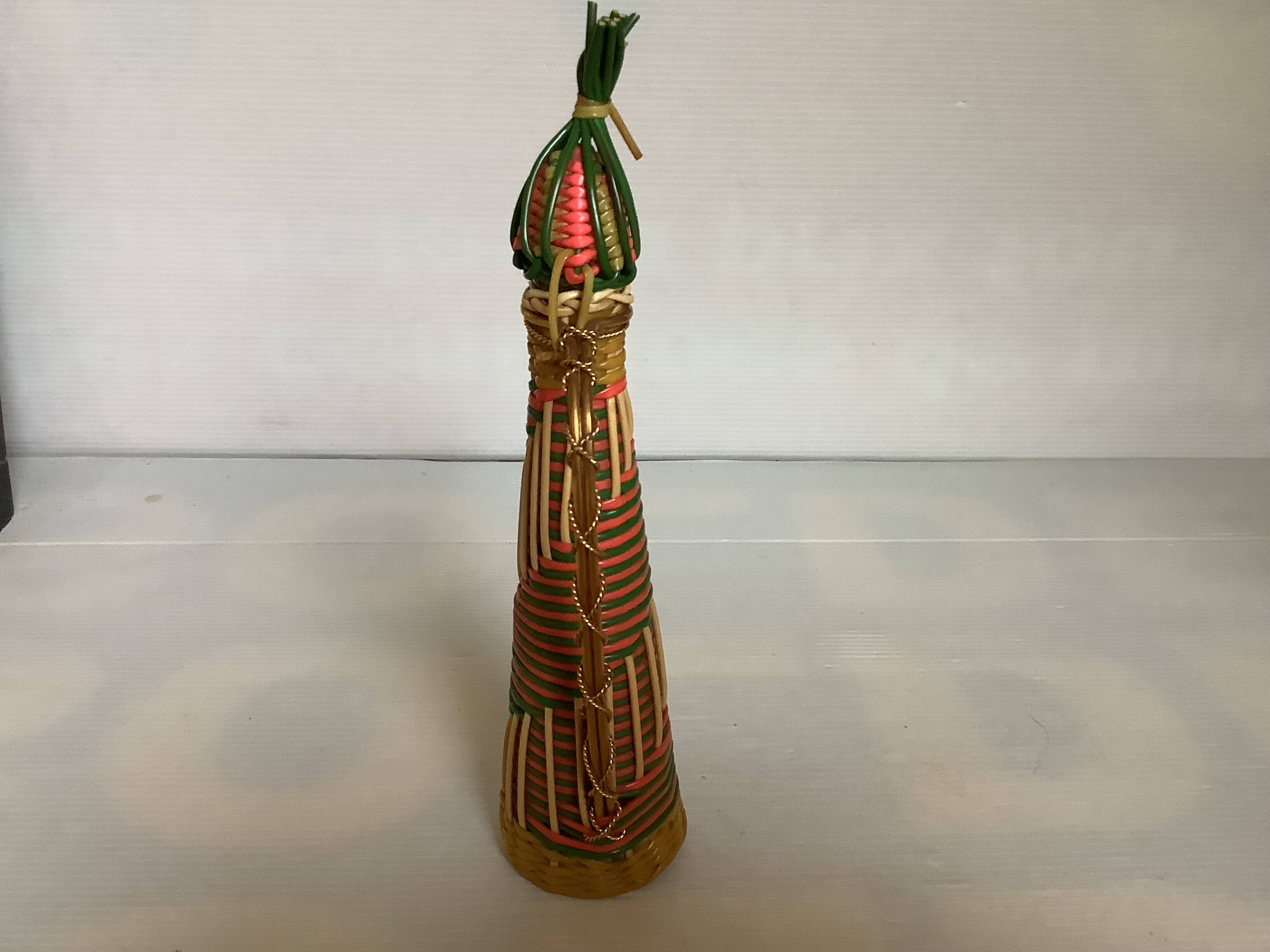 Multicoloured decorative mini bottle with gold metal.